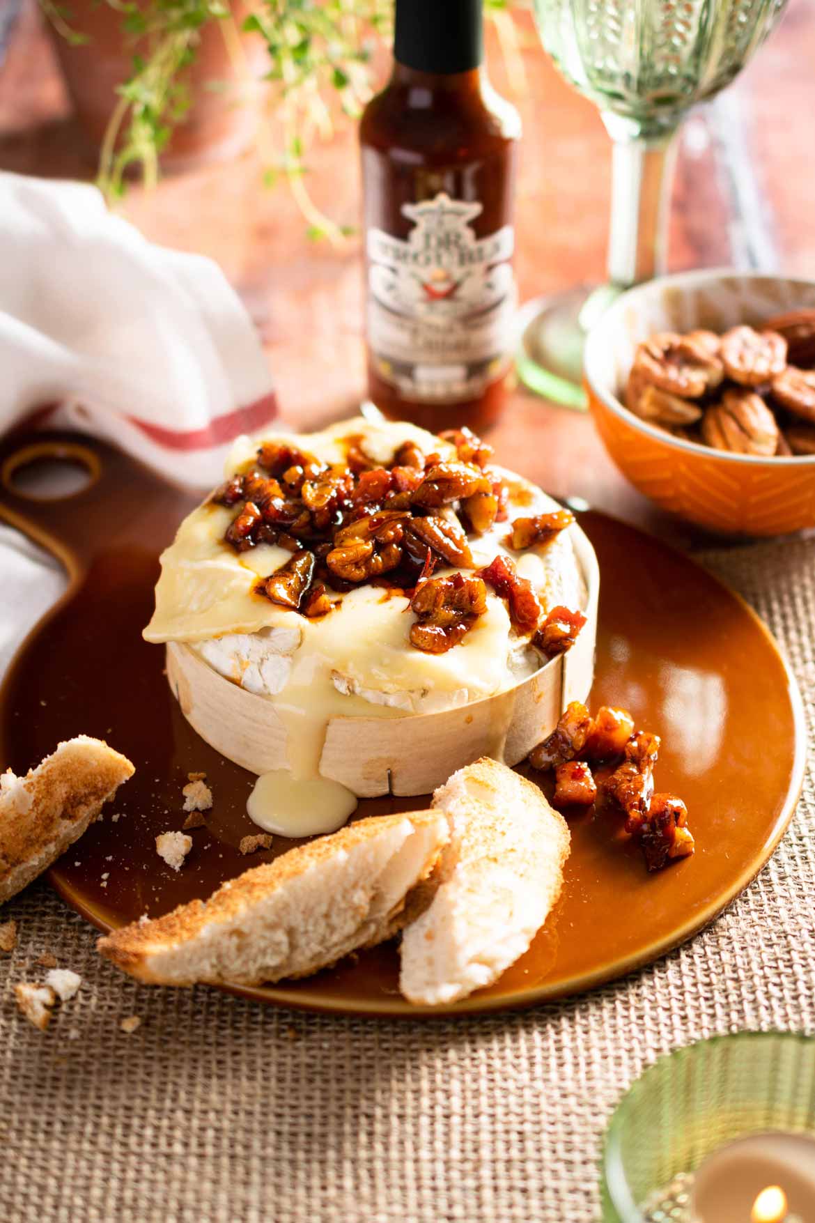 Dr-Trouble-Baked-Camembert-with-Smoked-Chilli-Pancetta-and-Pecans-with-hot-sauce-bottle